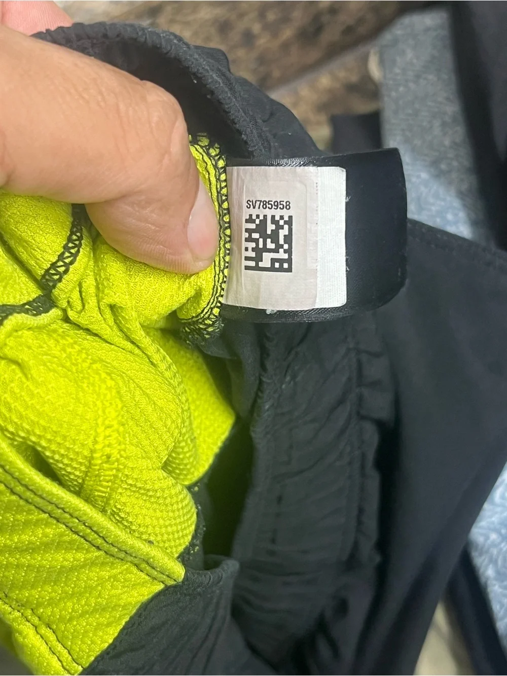 The North Face Men's Black Swim Shorts with Neon Yellow Side Panels